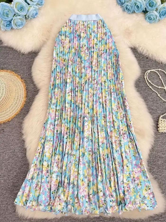 Nouvelle jupe plissée à imprimé floral pour femme, style vacances d'été 2026, élégante et polyvalente, jupe longue