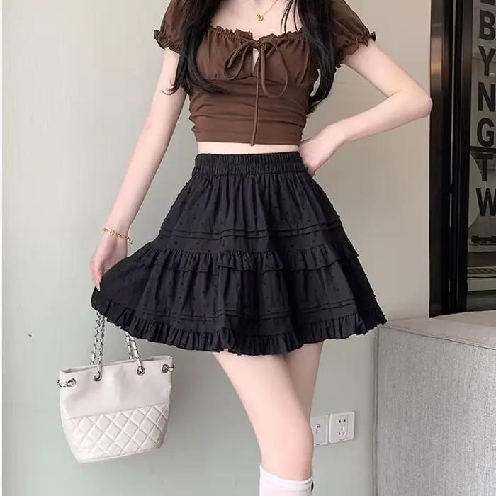 Mini-jupes plissées blanches taille haute Kawaii pour femmes