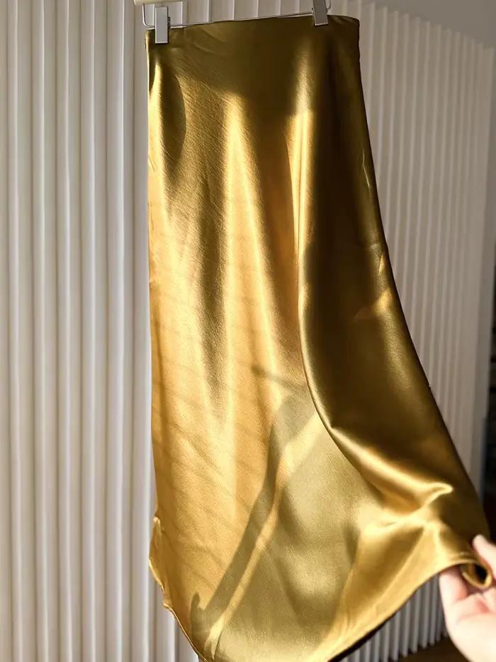 Jupe mi-longue en satin haute brillance pour femme avec fente scintillante
