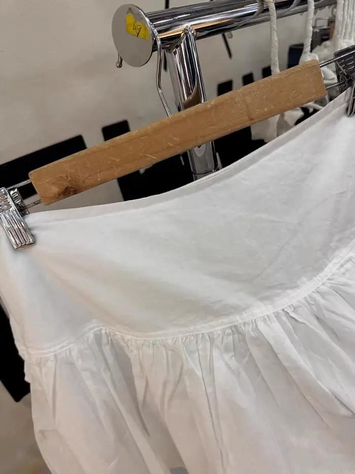 Mini jupes blanches pliables pour femme, taille basse, ligne a, courtes, décontractées, simples, assorties avec tout, Style Preppy, en coton, nouvelle collection été