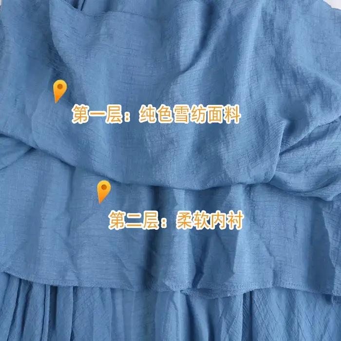 Jupe en lin femme printemps été 2025 nouvelles femmes Midi couleur unie sauvage irrégulière plissée bleu noir grande
