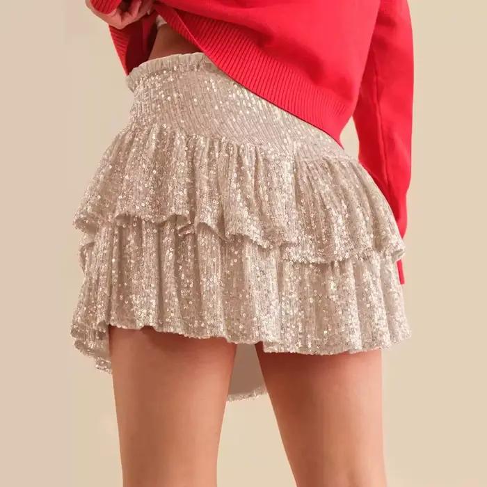 Nouvelle jupe courte plissée unie à sequins et perles pour femme 2026