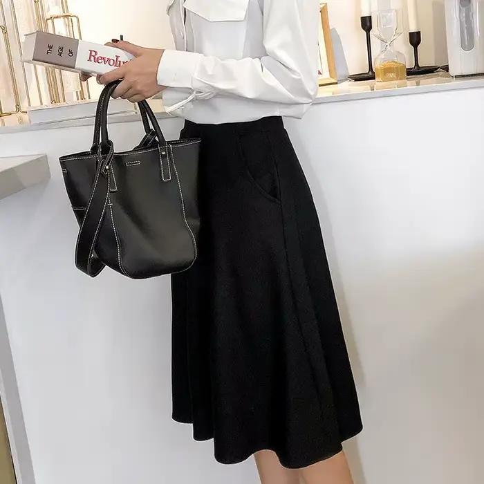 Jupes féminines à genoux longueur taille élastique jupe femme à volants mode coréenne pas cher vêtements chics et élégants tendance 2025 luxe