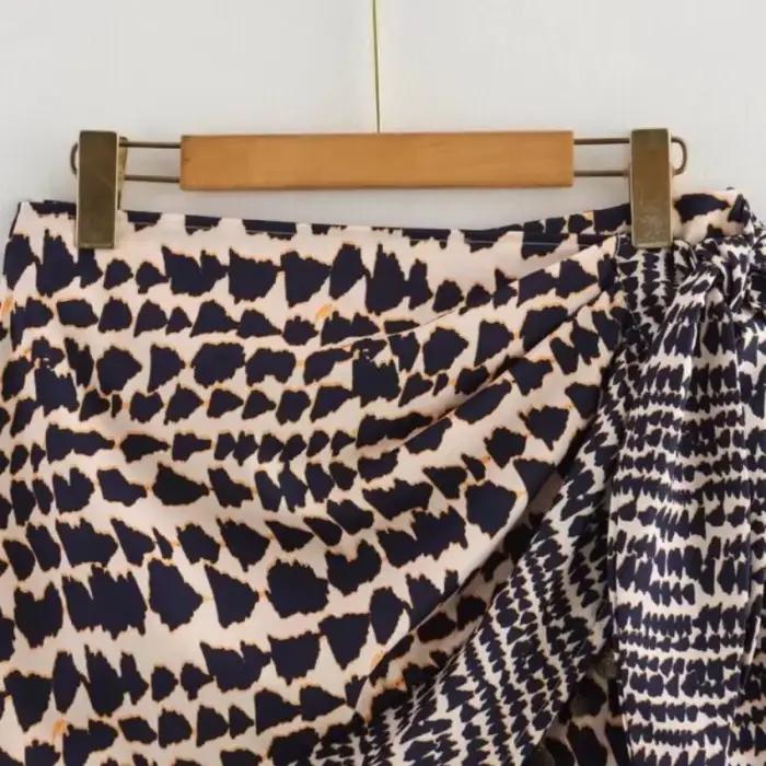 Jupe mini asymétrique sexy à imprimé léopard pour femme 2026 avec taille à nouer et ourlet à franges métalliques pour soirée et tenue de ville