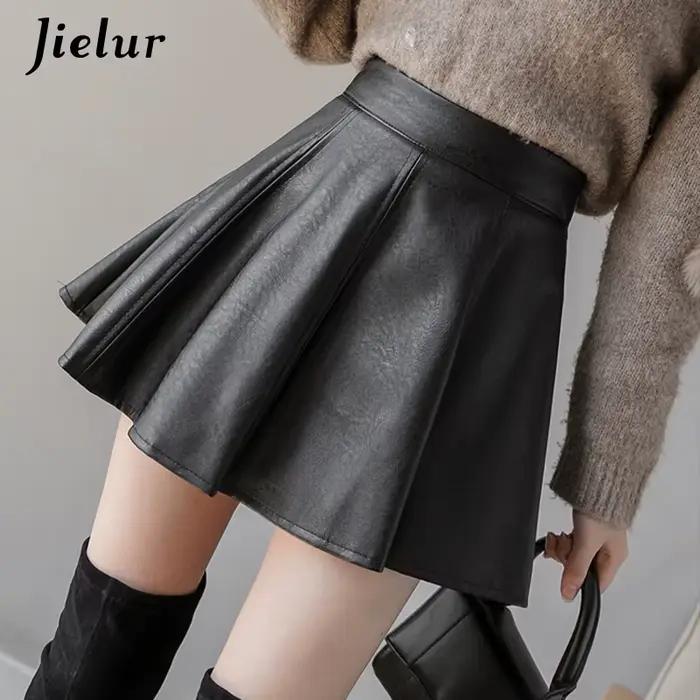 Jupe plissée Jielur en simili cuir pour femmes, élégante et polyvalente, idéale pour toutes les saisons, coupes régulières, tour de taille empire, mini longueur, polyester et simili cuir, multiple couleurs et tailles disponibles