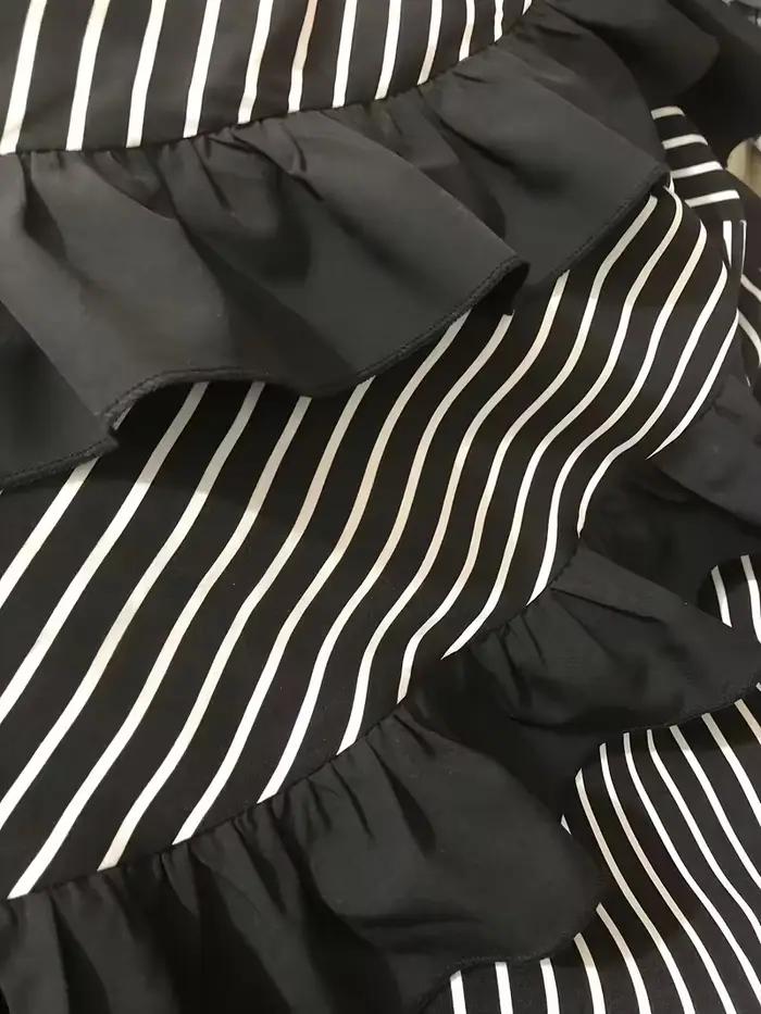 Jupe plissée de style gothique de couleur foncée avec ceinture élastique