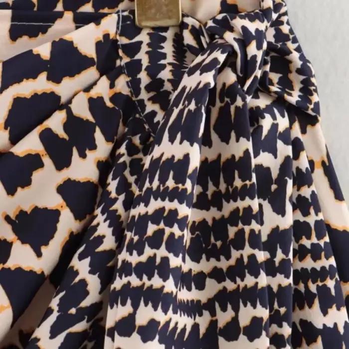 Jupe mini asymétrique sexy à imprimé léopard pour femme 2026 avec taille à nouer et ourlet à franges métalliques pour soirée et tenue de ville