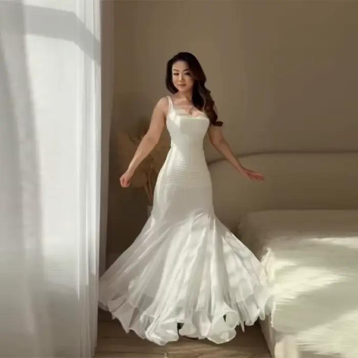 Jupe longue élégante à pois en mousseline, silhouette sirène, coupe taille haute, ourlet fluide à volants, idéale pour les femmes et les occasions formelles printemps été