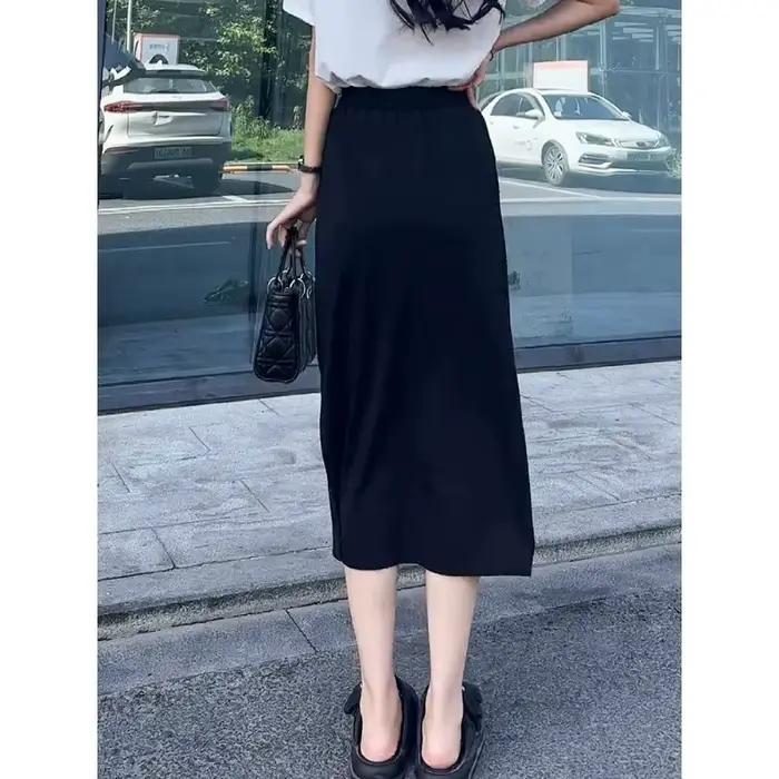 Jupe midi noire grande taille à fente latérale pour femme