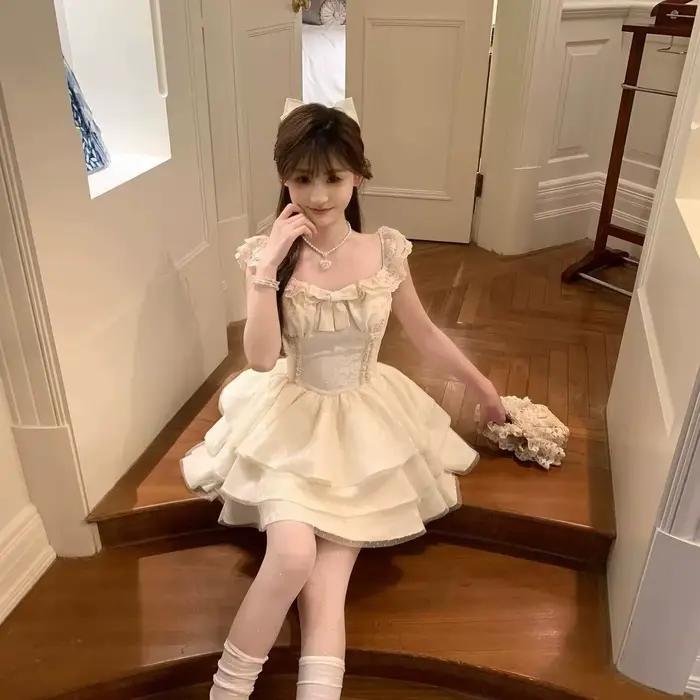 Jupe courte style princesse avec nœud papillon et manches bouffantes design taille haute amincissant robe trapèze fraîche et élégante été polyester pour femmes occasions spéciales
